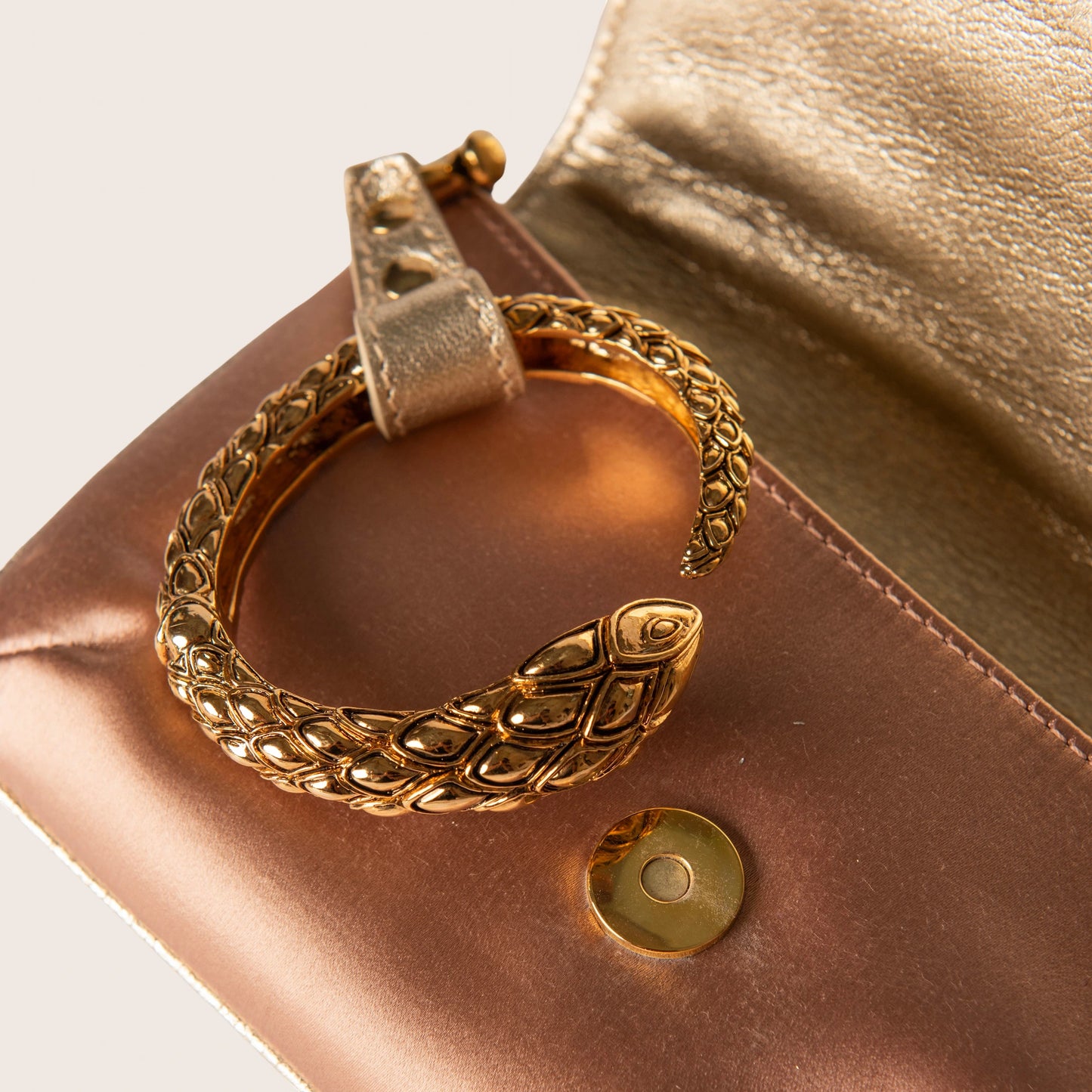 Roberto Cavalli Rose Gold Satin Clutch with Snake Bangle Bracelet