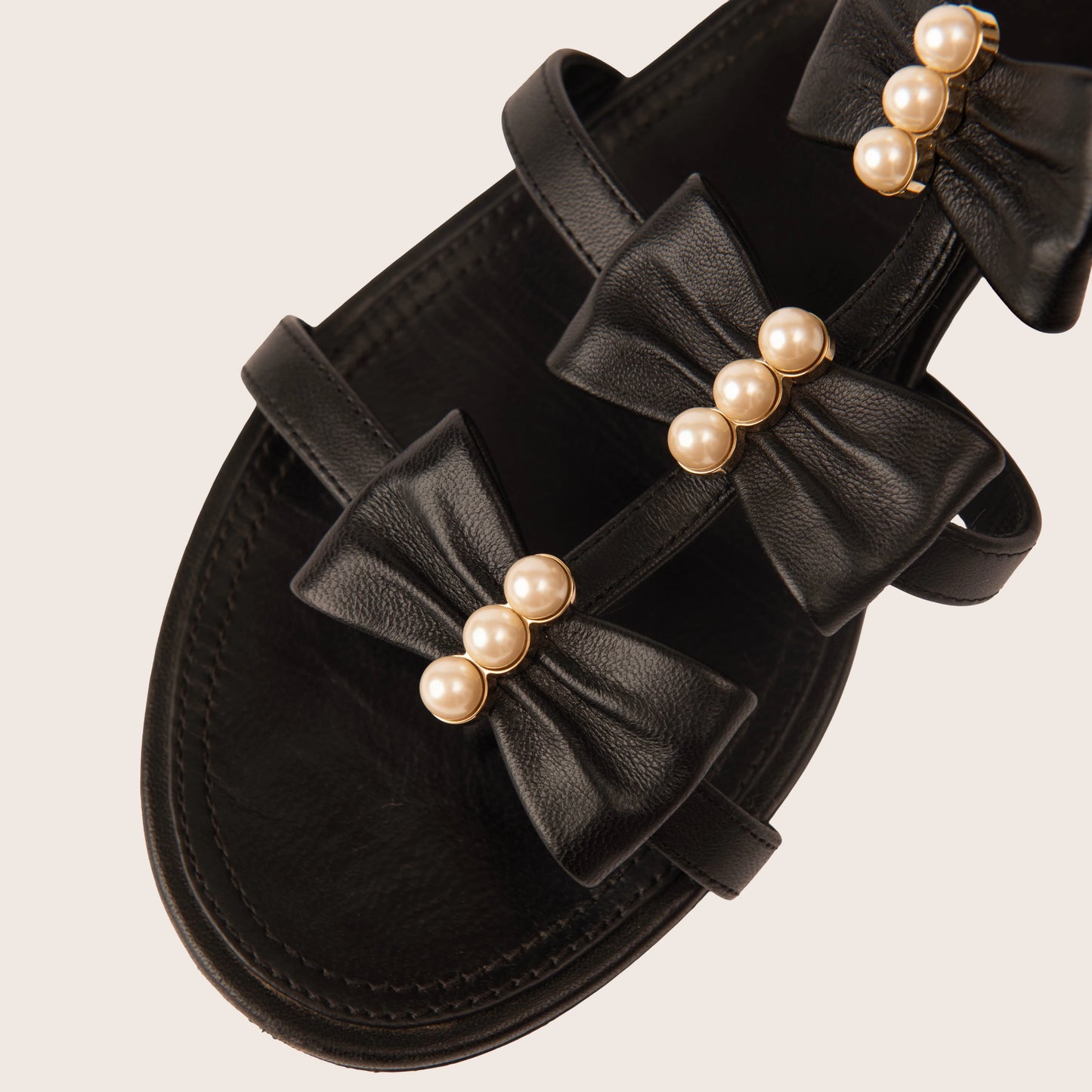 Chanel Black Leather Sandals with Pearl Bow Detailing