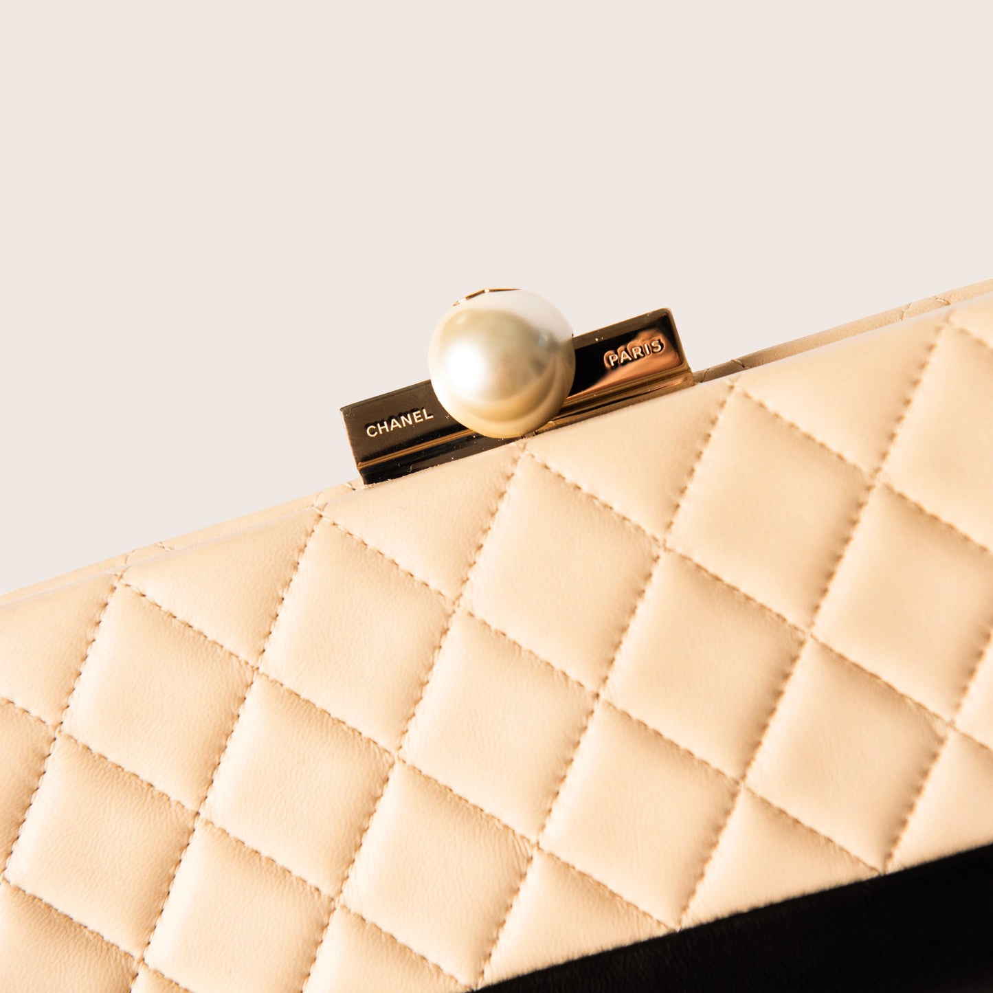 Chanel Quilted Leather Clutch with Pearl Closure