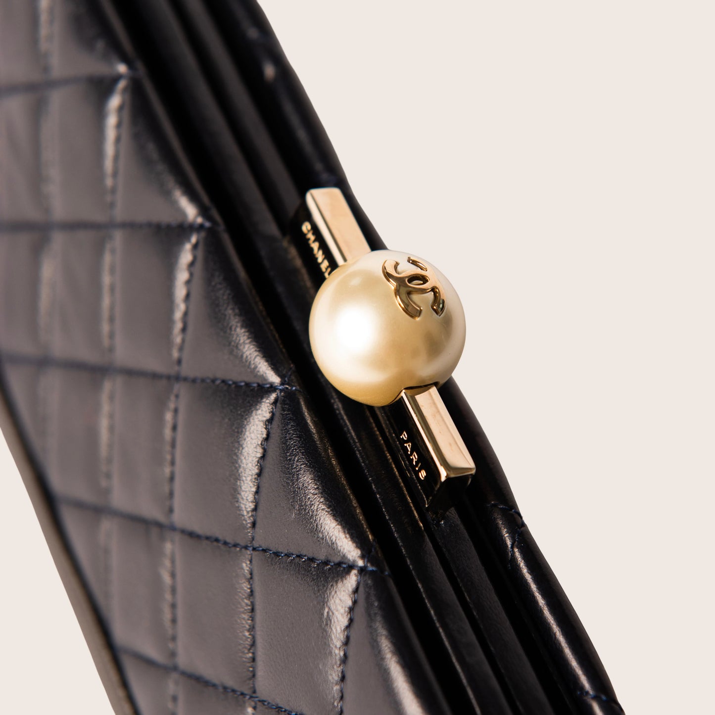Chanel Black Leather & Pearl Closure Quilted Clutch