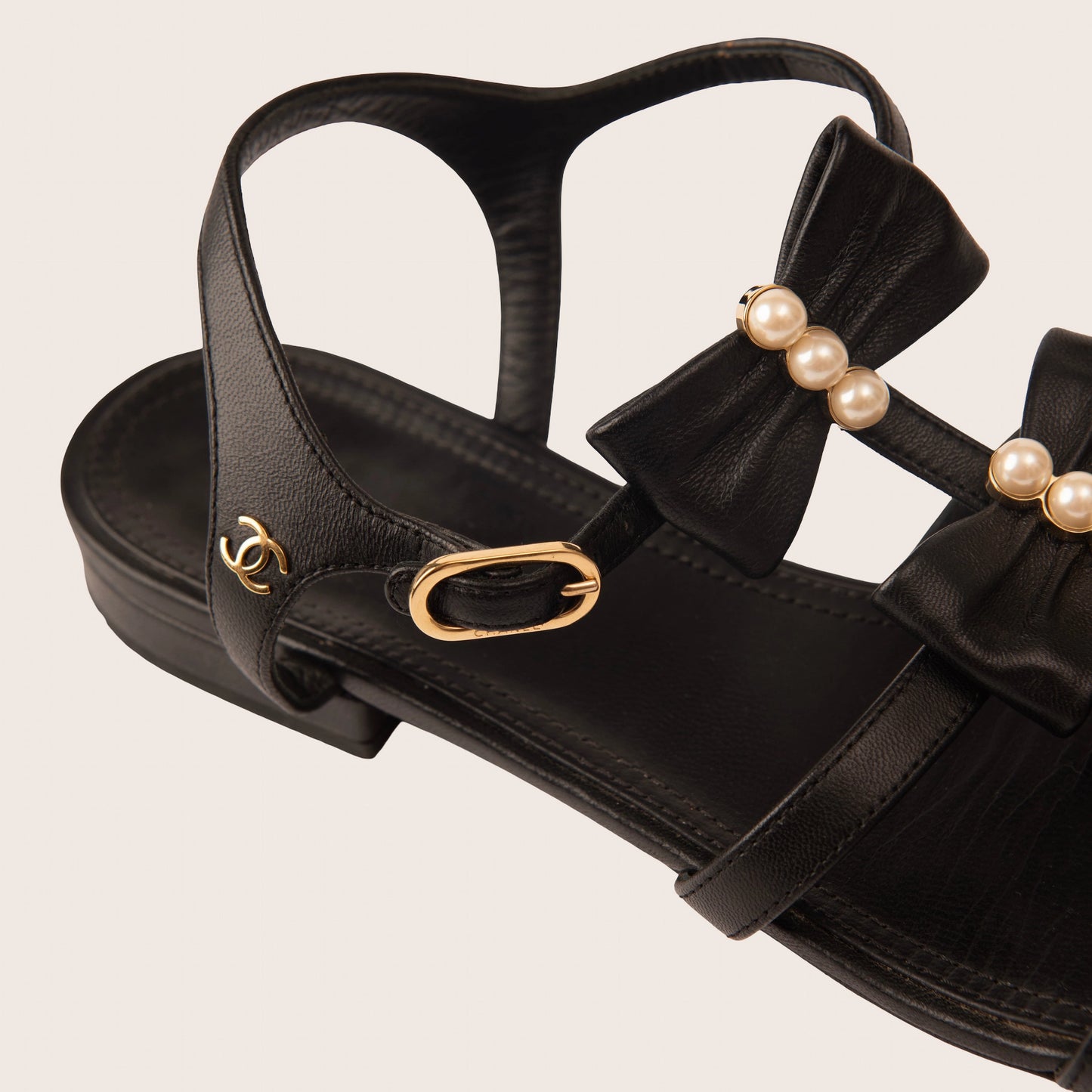 Chanel Black Leather Sandals with Pearl Bow Detailing