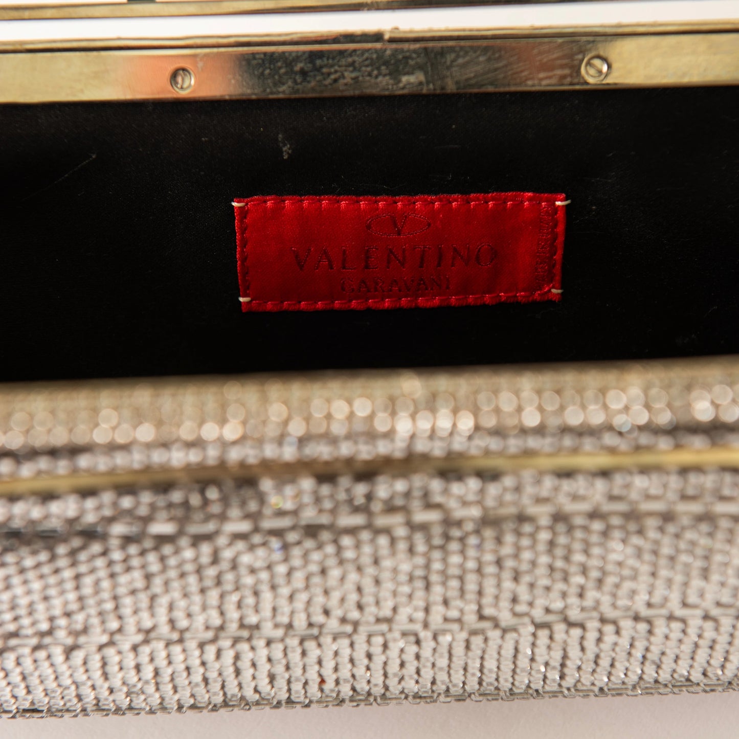 Valentino Crystal Mesh Clutch with Linear Frame Detail